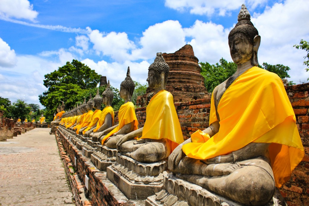 Buddha statues at the temple of Wat Yai Chai Mongkol in Ayutthaya near Bangkok, Thailand | Photo Credit: Shutterstock