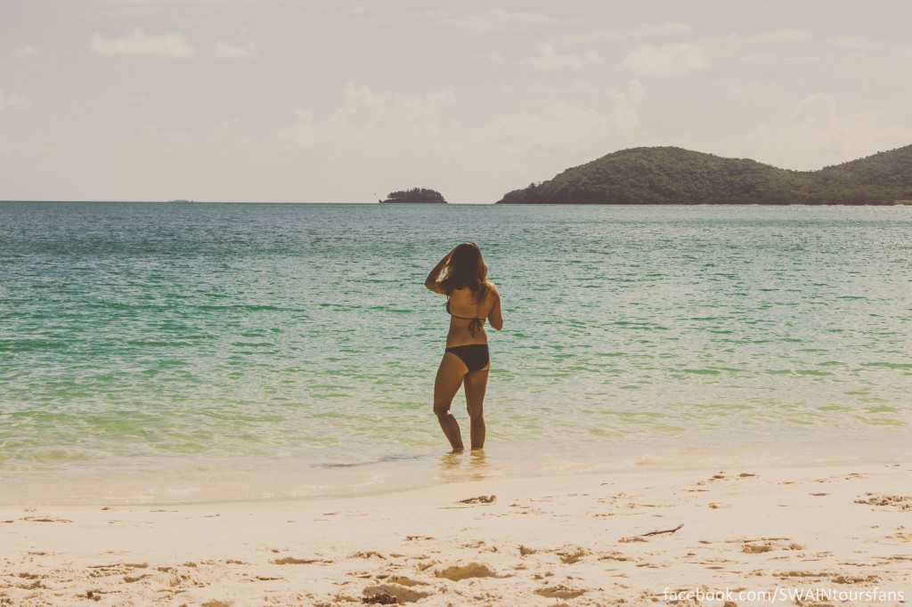 Kristen waling along the beach