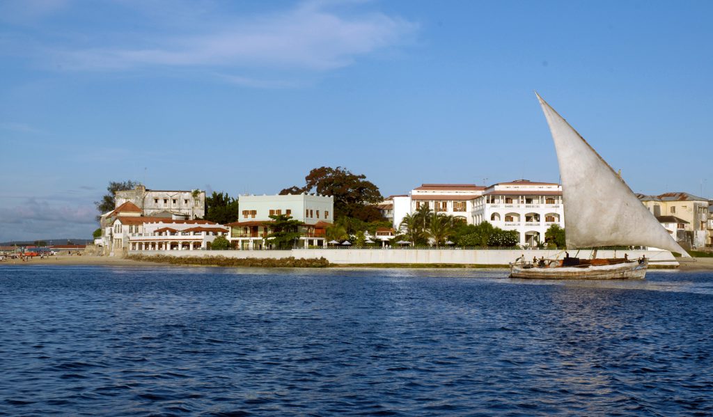 A Dhow boat sailing off the coast of Zanzibar