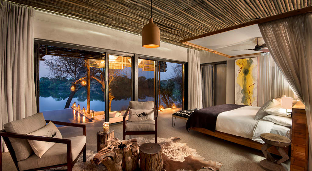 Image of Matetsi Victoria Falls' River Lodge Suite with a view of the Zambezi River out the windows