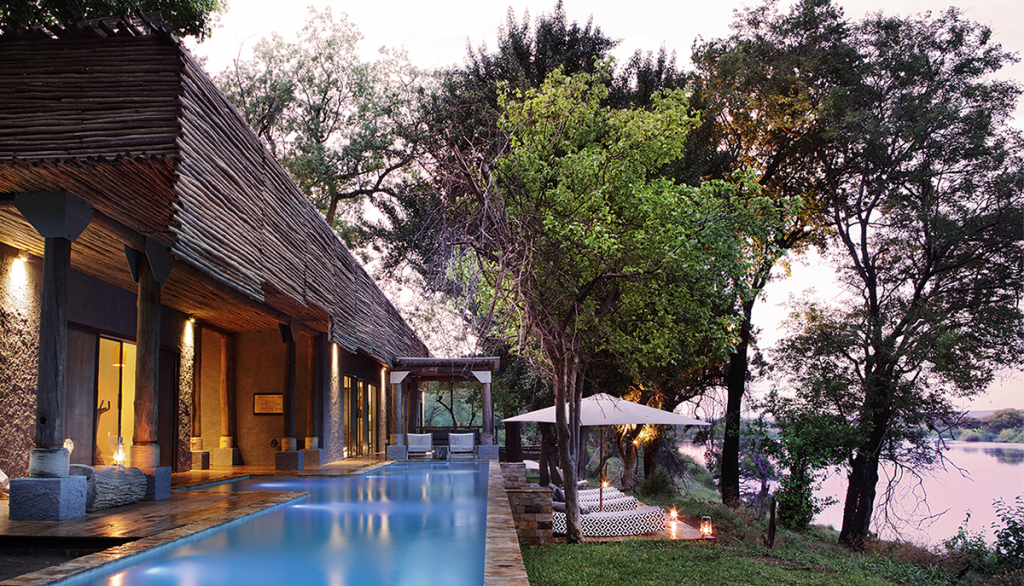 Image of the Matetsi Victoria Falls pool in the foreground with Zambezi River in the background